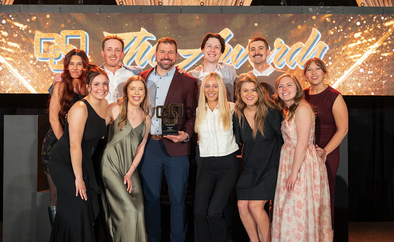 The AdShark team on stage with the Small Business of the Year award at the FMWF Chamber's Summit Awards