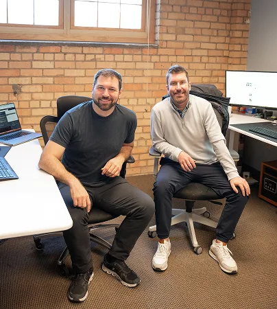AdShark founders Rick Berg and Sean Maki in the Fargo office