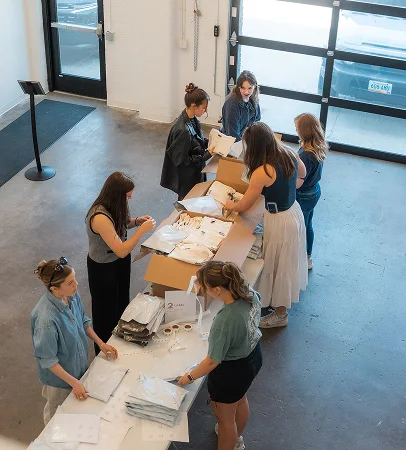 AdShark team packing client gift boxes
