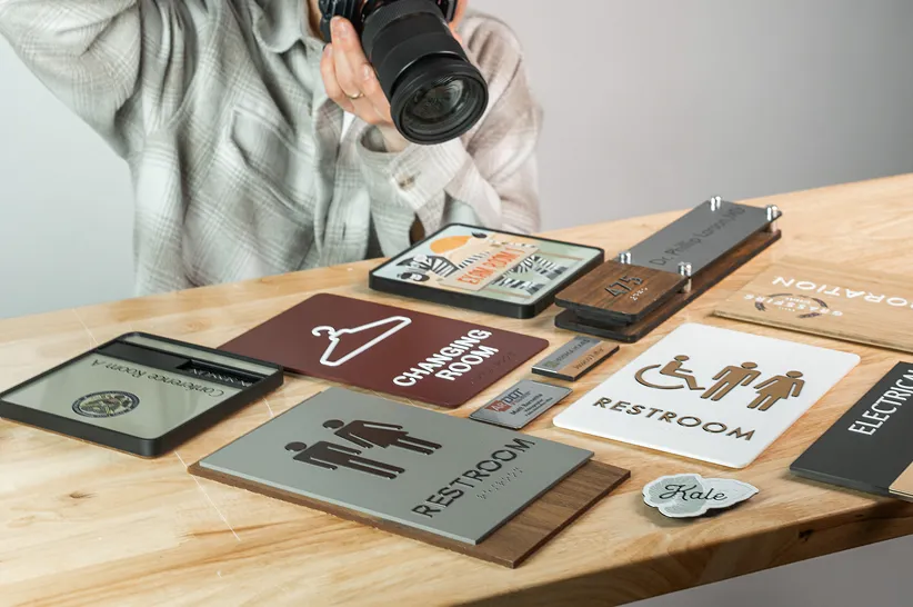 AdShark team photographing signage products