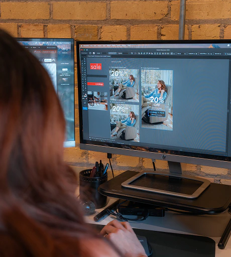 An AdShark designer building ad creative